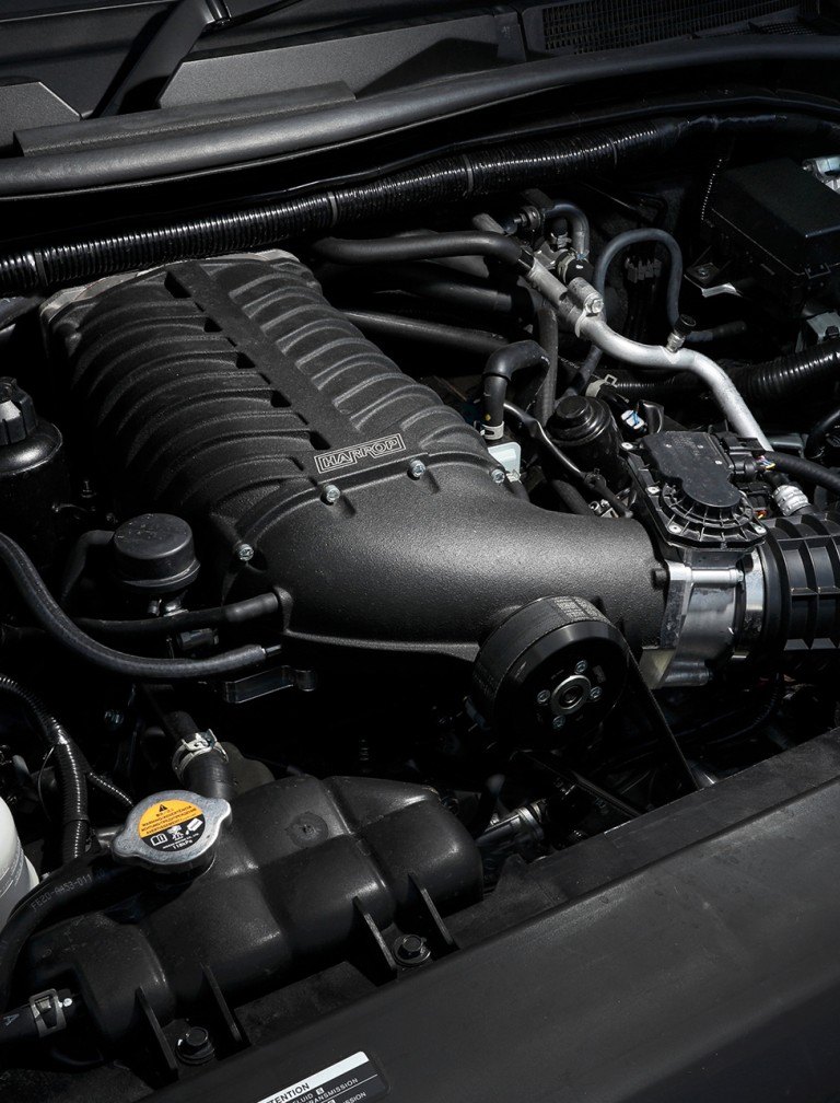 Harrop supercharger kit fitted to an LS engine in the engine bay